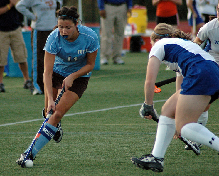 Amanda playing field hockey